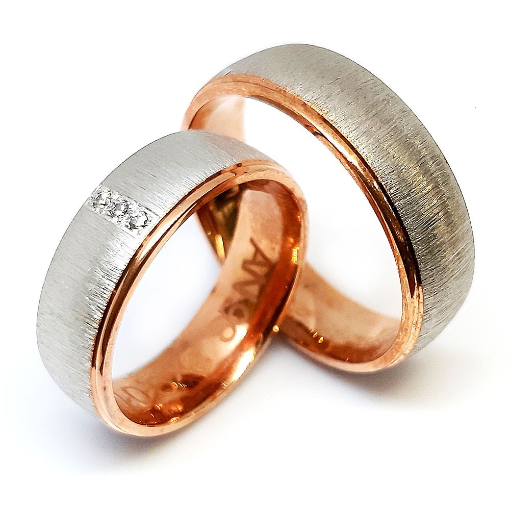 Ein paar Trauringe, Weiß- und Rotgold 585, mit 0,03 ct Diamanten (AN93)