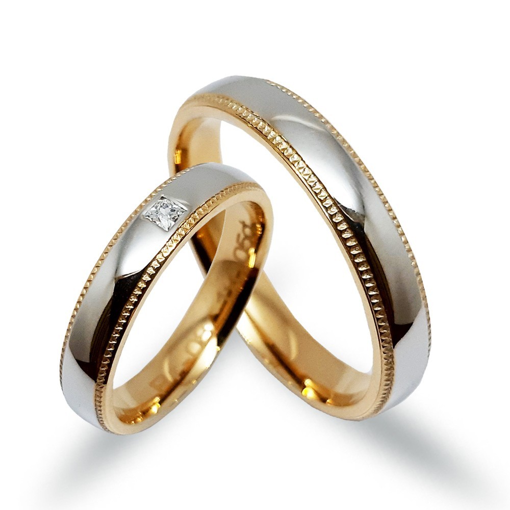 Ein paar Trauringe, Weiß- und Gelbgold 585, mit 0,05 ct Diamanten (PR08)